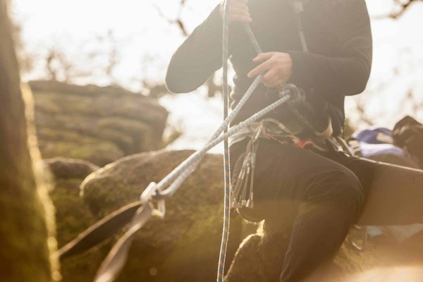 How should you program the adaptive cruise control on a British luxury sedan for optimal safety?